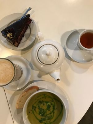 Latte, tea, daily offer and a cake.  at Mazā Terapija in Riga