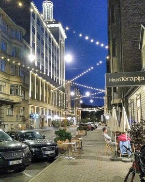 Street and porch at Mazā Terapija in Riga