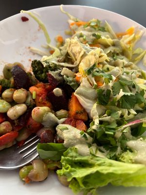 Warm salad with sweet potatoes, edame, red beets and broccoli.  at Mazā Terapija in Riga