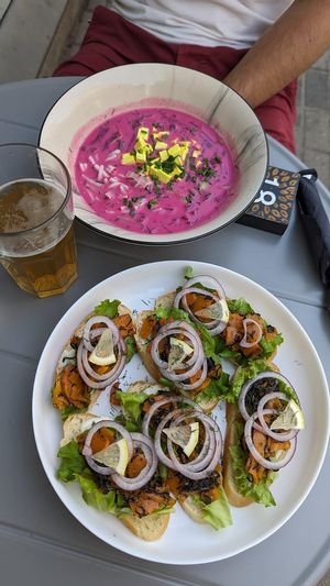 Beetroot soup, "carrot salmon" on toast at Mazā Terapija in Riga