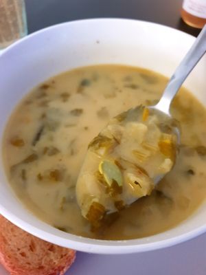 Creamy potatoes, yellow zucchini broth soup with edamame beans at Mazā Terapija in Riga