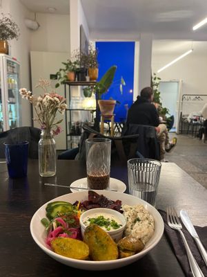 Eggplant “herring”, hot chocolate, and a bit of the interior. at Mazā Terapija in Riga