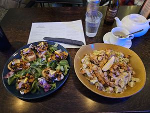 Salmon canapés and Ceasar's salad at Mazā Terapija in Riga
