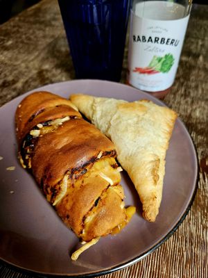 Cheese burek and sausage roll at Mazā Terapija in Riga