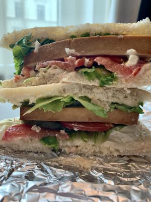 Tofu sandwich with lettuce, pickles, tomatoes and sauce    at Mazā Terapija in Riga