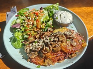 Potato pancake with mushrooms at Mazā Terapija in Riga