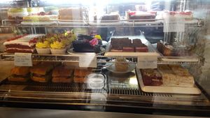 Cakes and sandwiches at Mazā Terapija in Riga