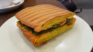 Sandwich with vegan sausage at Mazā Terapija in Riga