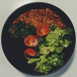 Pumpkin-tomato curry with black rice at Mazā Terapija in Riga