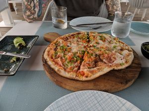 Vegan pizza. Chef Omar makes the cheese by whipping soymilk. at Azur - Four Seasons Hotel in Tunis
