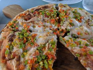Close-up of vegan pizza. You can see the whipped soymilk "cheese" at Azur - Four Seasons Hotel in Tunis