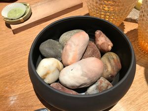 The two “Stones” in The middle are potatoes in a jacket of clay.  at Naturell in Ghent