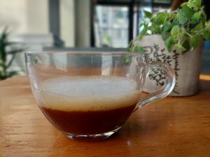 Fresh coffee with organic oat milk foam at Vegan 365 Kitchen in Skopje