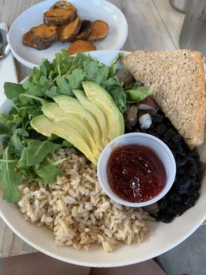 Power bowl with no egg, side of sweet potato wedges at Tribal All Day Cafe in Dallas