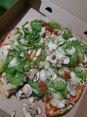 Gourmet veggie pizza with vegan cheese at Monte's in Blaxland