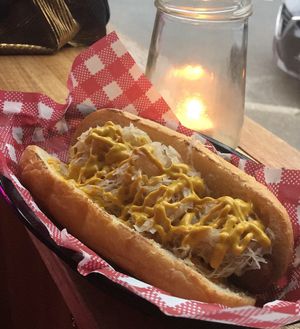 Wurst on a roll with mustard and kraut  at The Shady Lady in Fitzroy