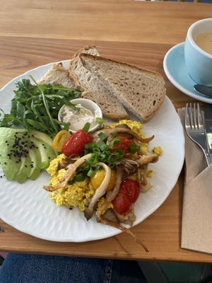 Tofu scramble and late with oat milk at Jaskolka in Warsaw