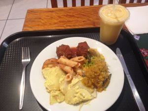 Potato bake, kofta, curry and pasta. Mango lassi extra. All vegan  at Govindas - Surfers Paradise in Surfers Paradise