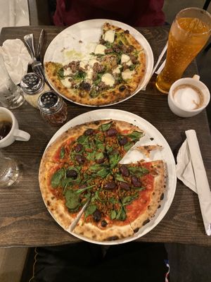 Vegan marinara pizza with vegan sausage. No cheese   Pizza furtherest is not vegan   at MidiCi in Estero