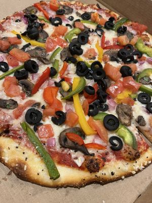 Vegan cheese on veggie pizza  at Blue Moon Pizza in Fort Myers