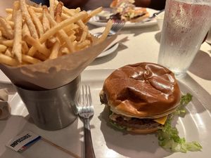 French fries and impossible burger with vegan cheese at The Counter in Naples