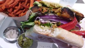 Vegan veggie patty with vegan mayo, guacamole, red onions, sprouts, roasted red peppers and organic mixed greens at The Counter in Naples