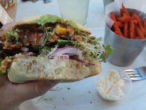 Custom burger: "vegan veggie patty", guacamole, sprouts, onions, lettuce on (vegan) ciabatta bun with "Just mayo" (vegan). at The Counter in Naples