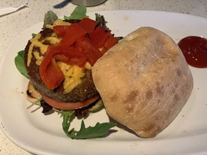 Impossible burger with vegan cheese on ciabatta. at The Counter in Naples