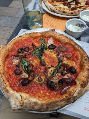 Marinara base with Kalamata olives and caramelized onions at Franco Manca in South West London