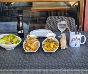 salad, fried spring rolls, fries at 1925 Gastropub in Olongapo City