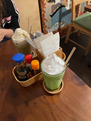 Iced matcha latte with vegan whipped cream at Ippuku Tea House in York