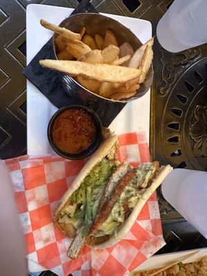 Chicken wrap with fries   at The Tilted Tiki in Stillwater
