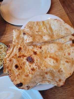 Garlic naan big enough to share at Bhajan Cafe in Krakow