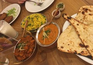 Garlic nan, aloo gobi and kofta at Bhajan Cafe in Krakow