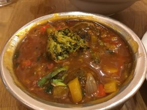 Chili Kofta, Indian vegetable cutlets in sauce. at Bhajan Cafe in Krakow