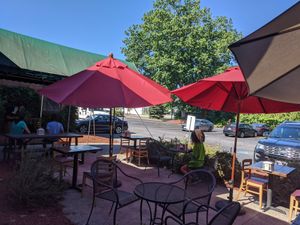Outdoor dining in a quiet parking lot at NU Kitchen in Worcester