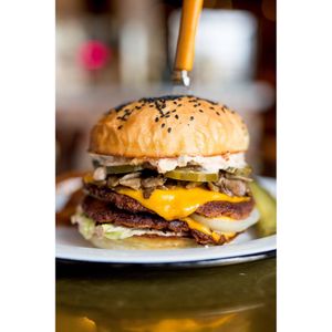 Double Burger - Seared Beyond meat double patty, mushrooms, shallot jam, roasted tomato spread, american coconut cheese, pickles at The Belmont Fermentorium - Modern Times Beer in Portland