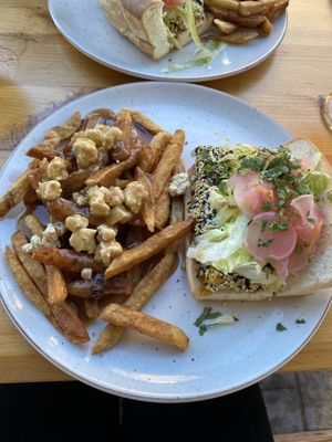 Bah mi sandwich with Tofu and side of vegan poutine at La Souche in Quebec