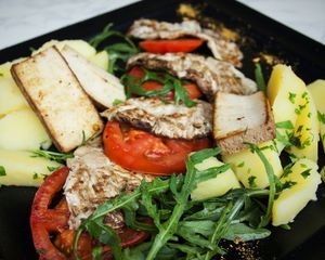 Vegan lunch: baked mushrooms with smoked tofu, potatoes, rocket and tomatoes.

Photo by: ‎Natalija B. on Facebook at Gostilna Mencinger in Gornja Radgona