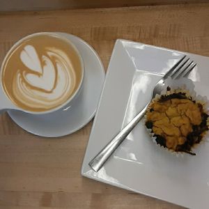 Amaretto Almond Milk Latté, Veg.Edible "Sausage" Quiche Cup: tofu, spinach, red bell pepper, & hashbrowns at Amateur Coffee in Omaha
