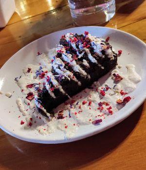 Vegan blueberry chocolate cake with cashew creme, was a bit bland, needed more sweetness and texture! at Polpetta in New Plymouth
