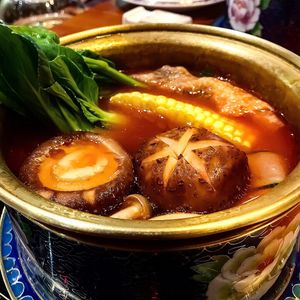 Tomato soup base hotpot at Ganglamedo Vegetarian Cuisine in Central Singapore