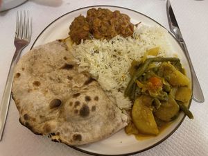 My plate with vegetable curry, bharta, rice, and chapati  at Goa Restaurant in Clermont-ferrand