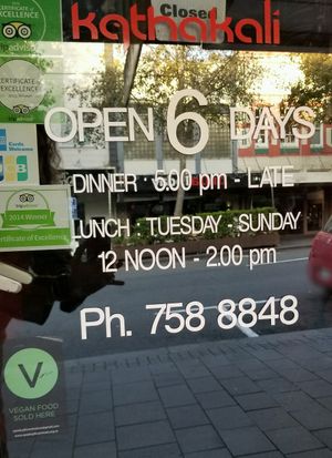Always love the vegan symbol on a restaurant door!  at Kathakali in New Plymouth