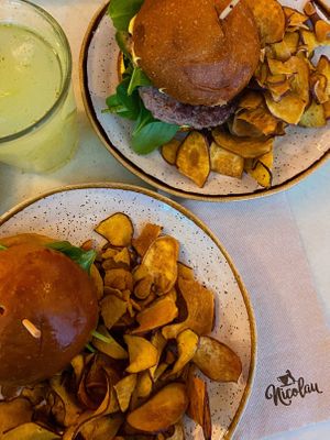 Chickpea Burger (10,5€) - hambúrguer de grão de bico e batata doce c/maionese de caril e manga, espinafres, tomate e chips de batata doce at Nicolau Lisboa in Lisbon