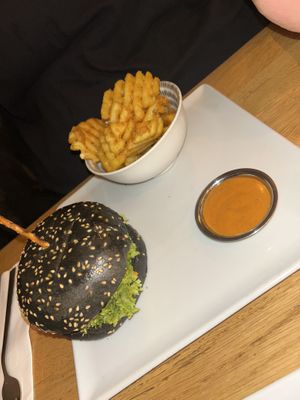 Black pepper bun with Mediterranean patty   at H&K's - Vlaamsesteenweg in Brussels