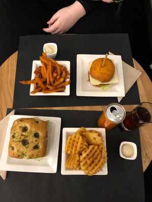 Burgers, fries, gaufrettes, vegan mayo, peach ice tea. at H&K's - Vlaamsesteenweg in Brussels