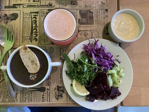 Menu of the day, plus a big pita bread with falafel   at Infusion Hope in Temuco