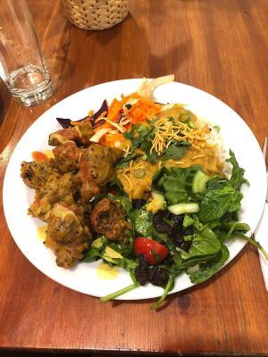 Vegan buffet... Curry, salad, pakoras, satay sauce  at Amrutha Lounge - Earlsfield in South West London