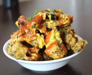 Crispy pakoras in onion seed batter  at Amrutha Lounge - Earlsfield in South West London